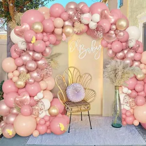 Pink and gold balloon arch kit with butterfly decorations for baby shower and birthday party decor