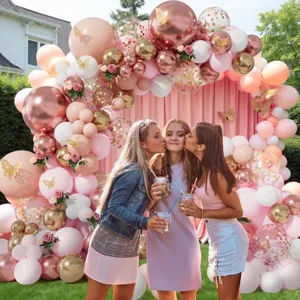 Pink and gold balloon arch kit with butterfly decorations for birthday party background decor.
