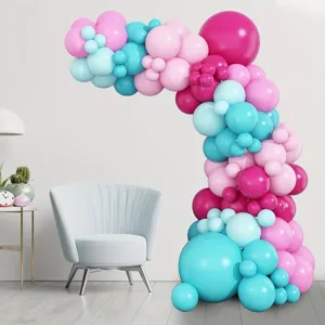 Detailed view of pink and blue balloon arch setup in a modern living room scene, perfect decor.