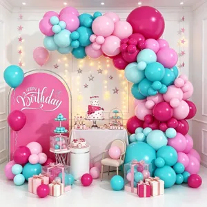 Birthday balloon arch backdrop set with pink and blue balloons for party decorations.