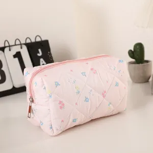 Bolsa cosmética acolchada rosa con estampado floral, gran organizador de maquillaje portátil.