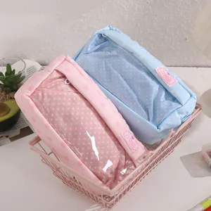 Cute polka dot pencil case with clear window, large capacity stationery bag for students.