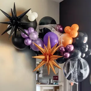 Halloween black purple balloon arch set with starburst balloons and spider web decor.