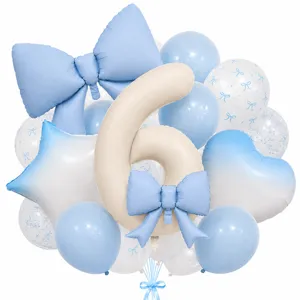 Detailed view of the luxury cream number 6 balloon with elegant blue bows for party decor.
