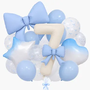 Detailed shot of cream number 7 and light blue bow balloon set for birthday party decor.
