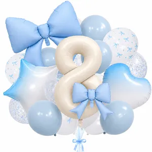 Detailed shot of birthday party balloon set featuring large number eight and blue bows.