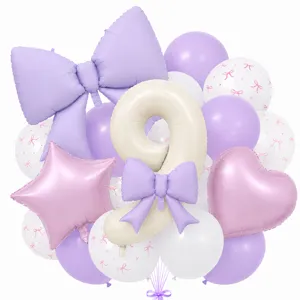 Detailed close-up shot of birthday party balloon set featuring number nine and cute bows.