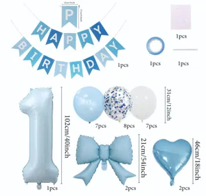 Matte blue birthday party balloon set with number 1 foil balloon, bow, and banner decorations.