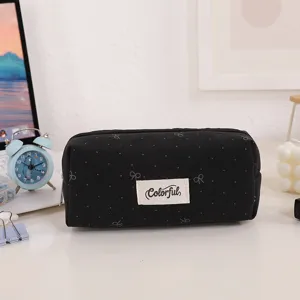 Black canvas pencil case with cute bows and dots pattern, large capacity stationery bag for students.