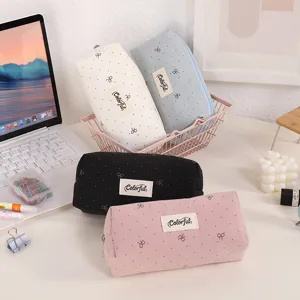 Large capacity canvas pencil pouch with bow embroidery, cute stationery case for students.