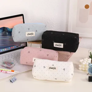 Detailed view of large capacity cute bow embroidered canvas pencil case in various colors.