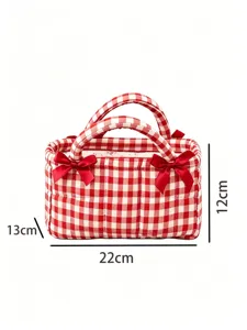 Detailed view of red gingham storage basket with cute bows, showing precise dimensions.