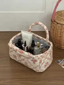French style quilted fabric cosmetic storage basket with handle for desktop organization.