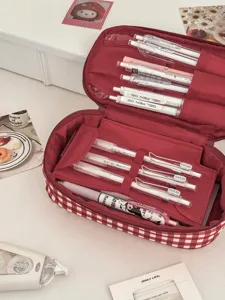 Detailed view of large capacity red checkered pencil case with multiple pen slots and cute stationery.