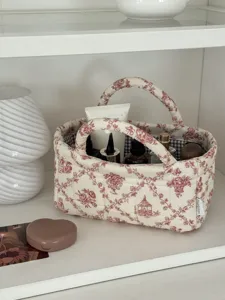 French Toile de Jouy fabric storage basket with handles, perfect for desktop cosmetic organization.