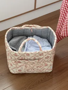 French floral quilted storage basket with grid lining, portable fabric clothes organizer bin.