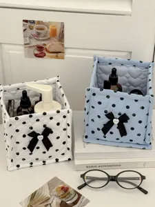 Cute quilted square storage baskets with polka dots and black bows for desktop and dorm.