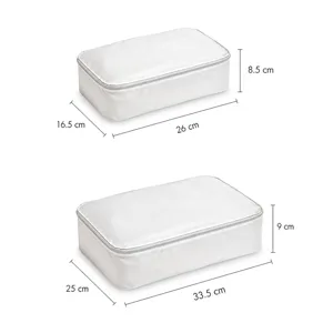 Detailed view of white travel storage bag with exact dimensions for sorting clothes easily.