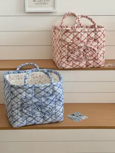 Gesteppter Schleifen-Aufbewahrungskorb, süßer Blumendruck, großer Handtaschen-Detail.