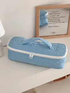 Borsa di stoccaggio trapuntata a cuore blu per asciugacapelli, organizer da viaggio portatile.