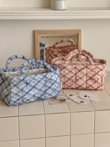 Quilted plaid bow storage basket fabric desktop organizer for snacks and sundries.
