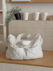 Floral quilted travel tote bag detail view, casual large capacity handbag for women and students.