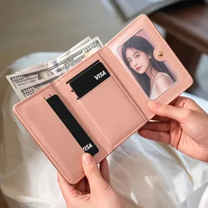 Pink trifold women's wallet with card slots, ID window, and cash compartment for daily use.