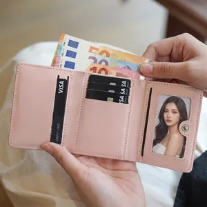 Minimalist pink trifold wallet with card slots and coin pocket for women daily use.