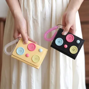 Korean style dopamine color trifold coin purse with cute buttons and spring coil keychain.