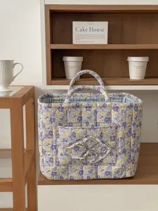 Gepolsterter Aufbewahrungskorb mit Frühlingsblumen, faltbare große Tasche für den Haushalt.