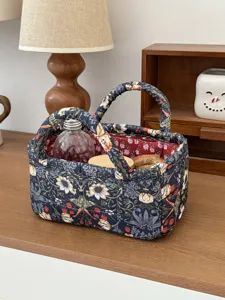 Quilted fabric storage basket desktop sundries organizer with dual handles vintage floral design.