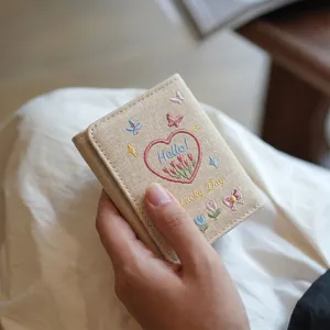 Women's short trifold wallet with cute embroidered floral heart design, compact card holder purse.