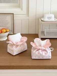Detailed view of cute polka dot flower fabric tissue box cover in a cozy home setting decor.