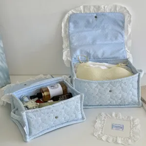 Blue quilted star storage basket with lace trim, cute large rectangular desktop organizer.