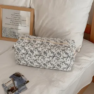 Borsa da viaggio trapuntata a fiori per strumenti per capelli e cosmetici, pratica ed elegante.