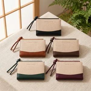 Stylish short women's wallet with lanyard and zipper, multi-color colorblock design.