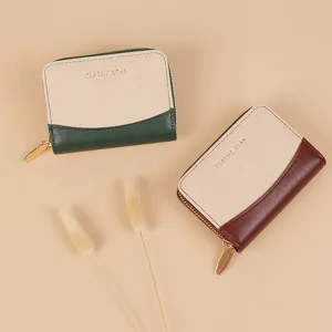 Compact PU leather zip card holder with multi-card slots and stylish contrast color design.