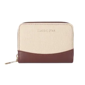 Detailed view of the small two-tone card wallet with zipper closure and metallic finish.