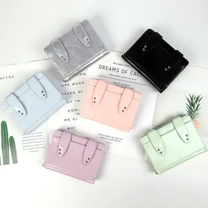 Detailed view of the cute bunny ear wallet cardholder, highlighting glossy multi-color finish.