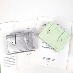 Shiny leather rabbit passport wallet with cute ears and card slots for women and travel use.