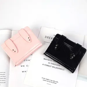 Cute patent leather rabbit passport wallet with bunny ear design and multi-card slots.