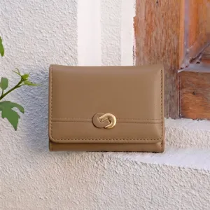 Minimalist solid color tri-fold wallet for women with card slots and metal buckle design.