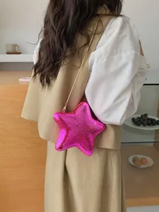 Elegante mini borsa da sera in acrilico a stella con catena metallica e borsa rosa.