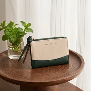 Canvas bi-fold women wallet short coin purse with zipper closure and cute lanyard detail.