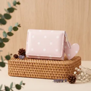 Portafoglio rosa a pois con ciondolo a cuore, porta carte compatto e minimalista donna.