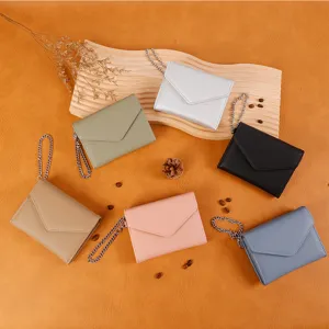 Women's solid color mini wallet with chain, minimalist lychee pattern short coin purse.