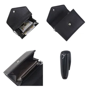 Black pebbled leather short wallet for women with snap closure, card slots, and coin pocket.