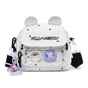 Cute star print shoulder bag detail with bear ears, clear front pocket and hanging charm.