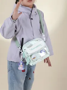 Kids cute crossbody bag with clear front pocket, star pattern shoulder bag for girls.