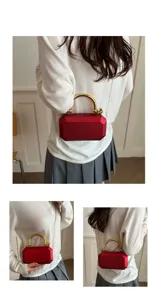 Red acrylic box evening bag with gold handle and chain strap, elegant women crossbody purse.